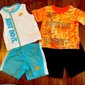 Two matching sets Nike tank top/ shorts and swiggles short sleeve/shorts